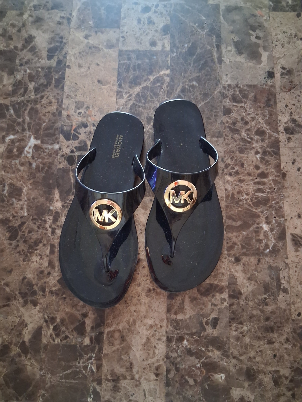 Michael Kors Black Jelly Logo Thong Sandals with Gold MK Emblem